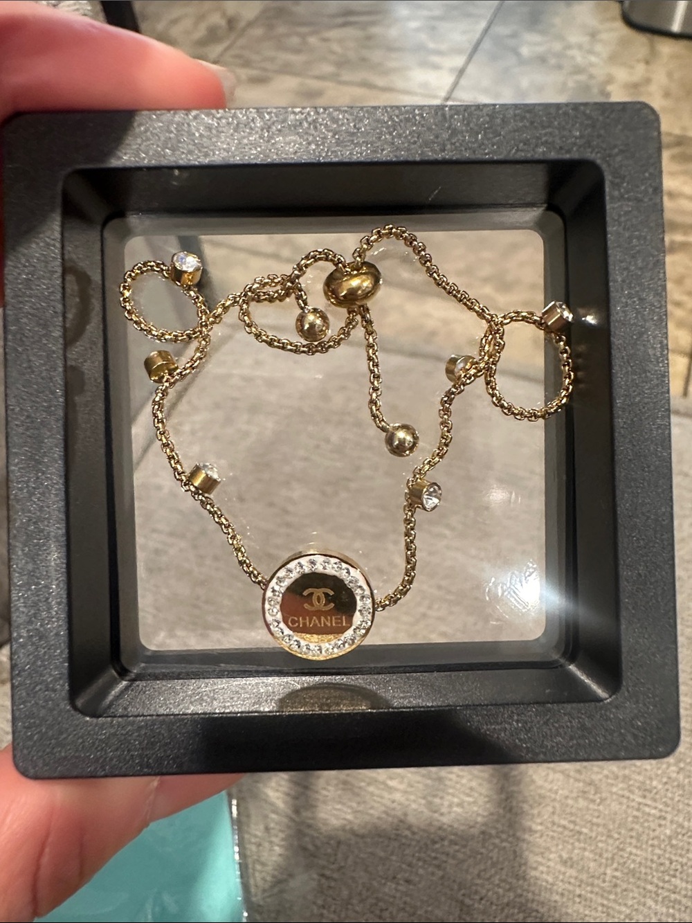 Gold-Tone Crystal Logo bracelets